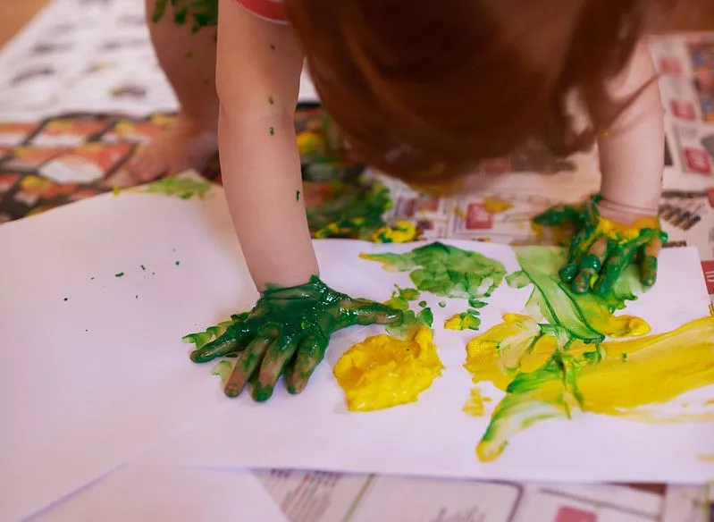 Finger painting preschooler