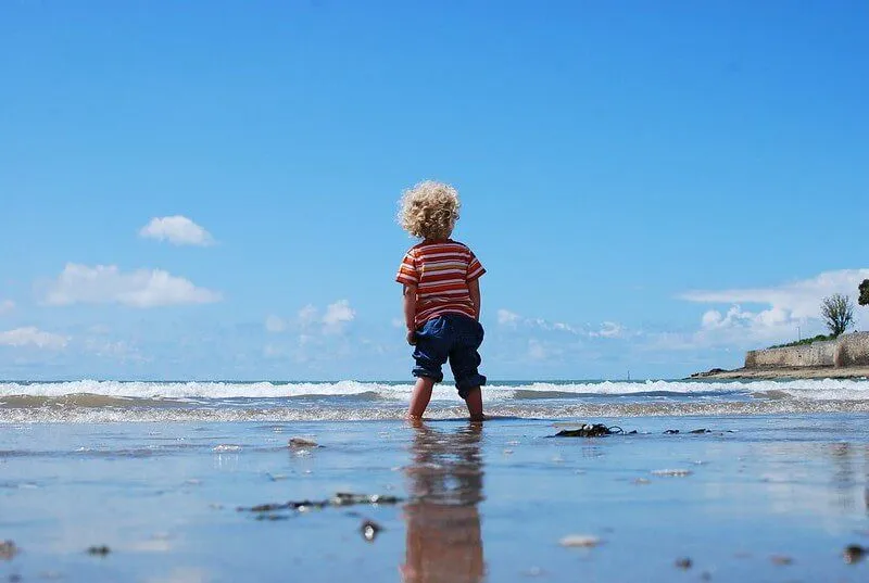 Boy enjoying great beaches and coastline in Dorset