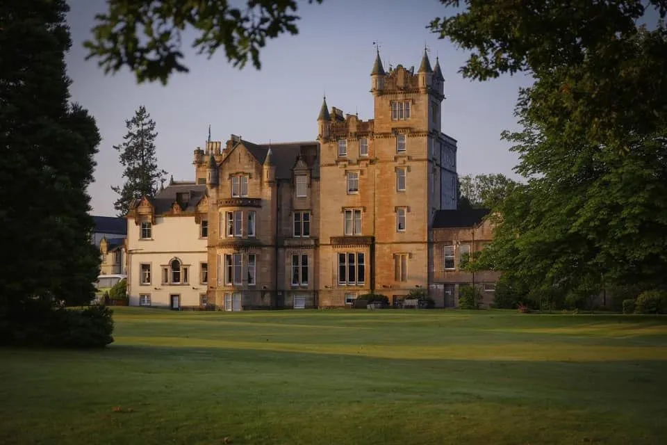 Grand facade of Cameron House, set in the Scottish countryside.