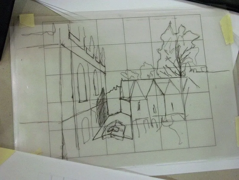 A sketch of old buildings and a tree.